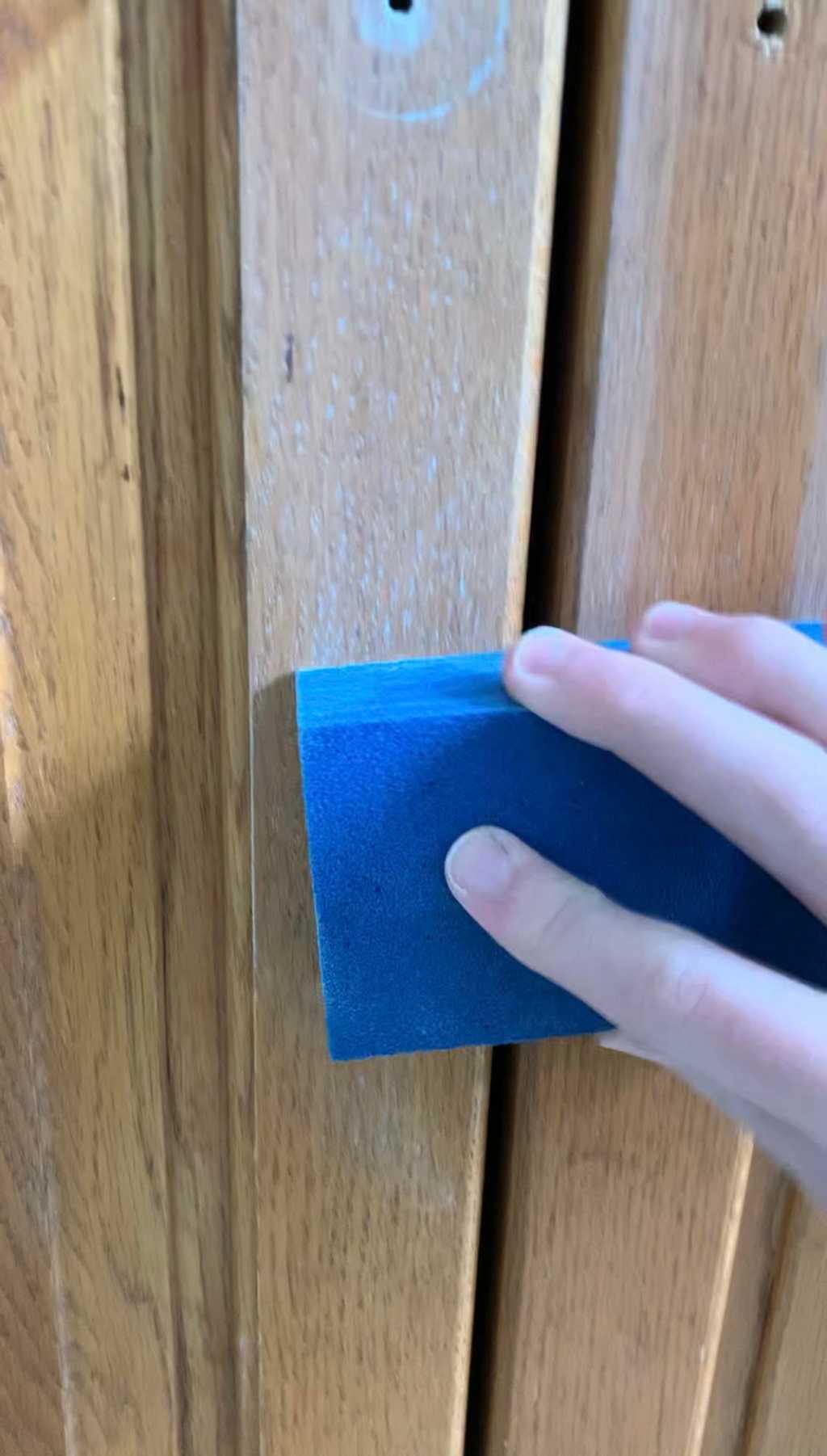 Sanding the bathroom vanity door